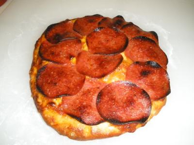 A Homemade Salami & Cheese Pizza